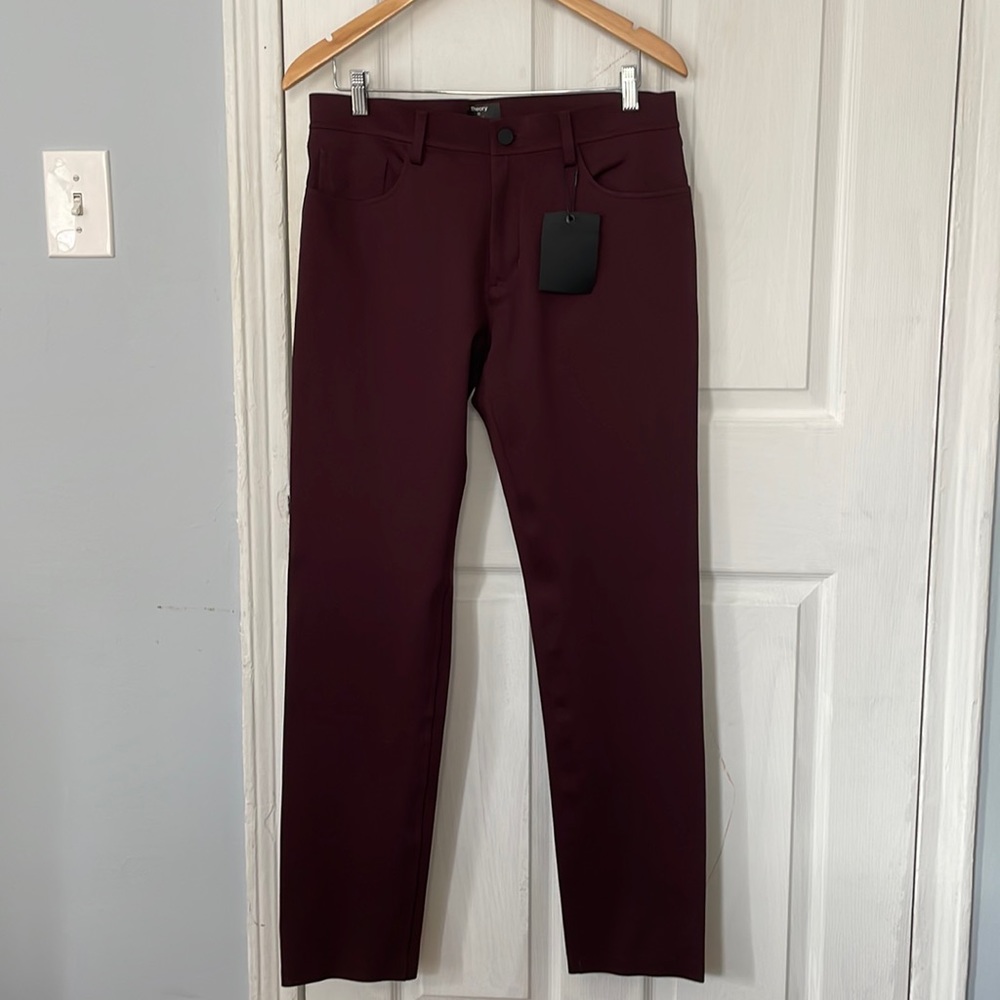 Theory slim tapered tech Raffi pant in Chianti. Tags on